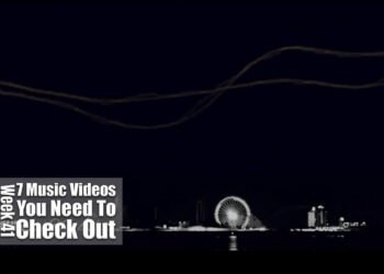 Still from Aysula's music video for "twelve". The image focuses on the skyline during night time.
