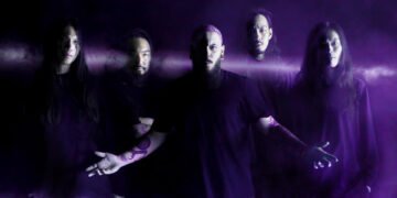 2023 band photo of Crystal lake, with frontman John Robert Centorrino in the middle.