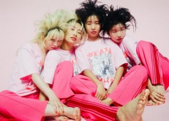 The four women of CHAI are dressed in pink and having their hair styled like 'punks' (hair is styled up), which might be a nod (or maybe better a wink) towards their first albums, titled "PINK", "PUNK" and "WINK". Photography: Kana Tarumi