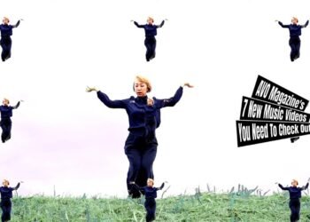 Still from the music video "Active Imagination" by THE MOLICE. Vocalist Rinko is dancing on a grassfield and that image has been multiplied on the screen.