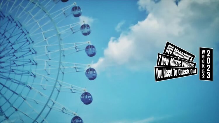 Still from Jikou's music video for the song "マイナスヨンド (Minus 4℃)". The still contains a part of a Ferris wheel and the daylight sky with a big cloud.
