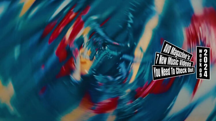 Still from Er's music video for "風船 (Balloon)". Something that looks like a painting spins around in the picture, making it look blurry, but also artful.