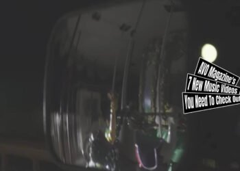 Still from the music video "メリーゴーランド (Merry-Go-Round)" by the band アメリカンカール (American Curl). The still consists of a mirror that shows part of the Merry-Go-Round.