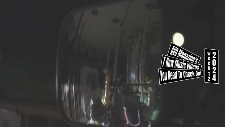 Still from the music video "メリーゴーランド (Merry-Go-Round)" by the band アメリカンカール (American Curl). The still consists of a mirror that shows part of the Merry-Go-Round.