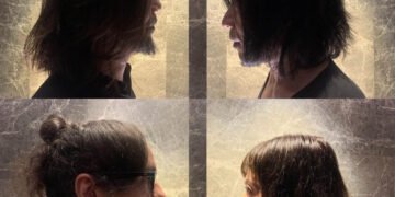 The photo features the members of MONO facing each other with their profiles highlighted against a background that suggests an intimate atmosphere. They are depicted in such a manner that creates the illusion of being mirror images of one another, yet distinct individuals.