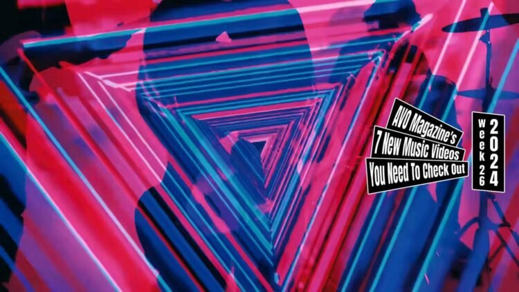Still from BOOKERS' music video for the song "昼夜逆転 (Day Night Reversal)". The still contains an artistic and vibrant image featuring the performing band members and an effect which seems to create an ongoing and moving triangular tunnel with an array of pink, red and blue. This effects comes back in other places of the music video. The video is directed by Yasuhiro Amano.