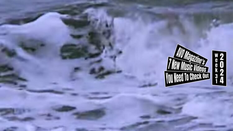 Still from the music video "日が落ちた (Hi Ga Ochita)" by 乙女絵画 (Otomekaiga). The still features the waves of the sea in 480p video quality and blown up for the header, giving the idea that it appears out of focus. Filmed, directed and edited by Kyosei Ozaki (CHEMTRAIL)
