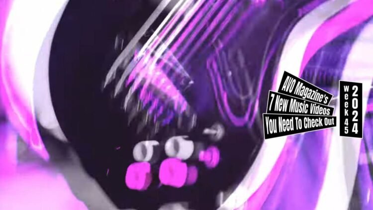 Still from CozyLand's music video for the song "Warltz", which is directed by Miyaryo. Lighting director: Andy(And film) and cinematographer: Mizuki Tsuji. The still focuses on one the guitar that gets played, but with an effect where several frames are overlapping that creates a sort of delay (probably RGB split), which gives a bit of a psychedelic effect. The still is not in focus to show an insight of the movement in the music video.