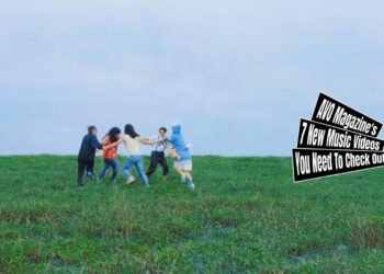 Still from "はじまりつづけてる (Hajimari Tsudzuketeru)" by 大丈夫 (Daijobu). The five members of Daijobu formed a circle and holding hands on a grassfield. Directed by 坂元ぽん太 (Ponta Sakamoto), who also did the cinematography, editing, planning and composition of the music video.