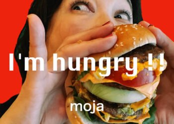 'I'm hungry !!' album cover, where one of the band members of Moja is eating a cheeseburger.