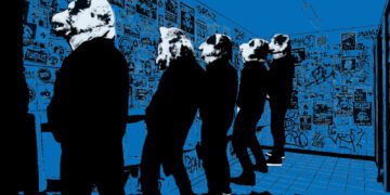 A photo of the five band members of MAN WITH A MISSION standing in the men's restroom “marking new territory,” a reference to their upcoming world tour. The photo has been edited to give it a cartoon-like appearance with blue background, black silliouettes and the members' wolf heads in a halftone-ish filter. Taken from the tour flyer promoting the European summer tour. © Sony Music Labels Inc. / Century Media Records