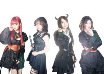 The photo shows the steampunk metal band FATE GEAR, dressed in dark gothic and steampunk-inspired fashion, standing next to each other against a white background. © Steam Steel Records
