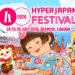 Poster Artwork for HYPER JAPAN Festival 2026, consisting of an illustration with mascot Nacchan dressed in a yukata while enjoying takoyaki and holding a video game controller. She is surrounded by the booths that offer Japanese food and drinks, maneki neko, race car, Gundam, a main stage with a performer and a big audience and Big Ben, representing what you can do at the Japanese culture festival in London.